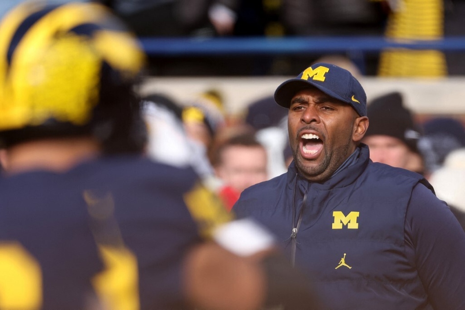 Sherrone Moore, the current offensive coordinator for the Wolverines, could be the ideal candidate to fill Jim Harbaugh's shoes should he leave for the NFL.