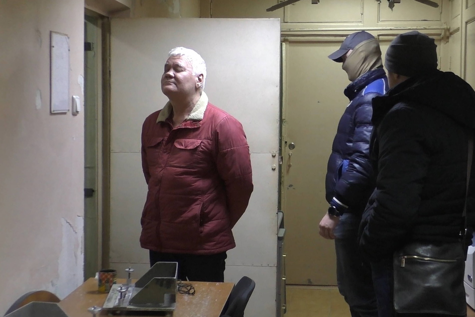 Robert Shonov (l.), a Russian national who worked at the US consulate in Vladivostok, Russia, was arrested on espionage charges.