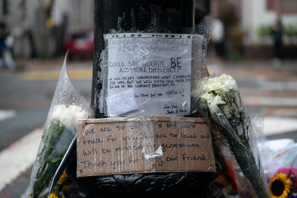 Flowers and tributes were left after the death of Matthew Perry outside the apartment building which was used as the exterior shot in the TV show Friends in New York on Sunday.