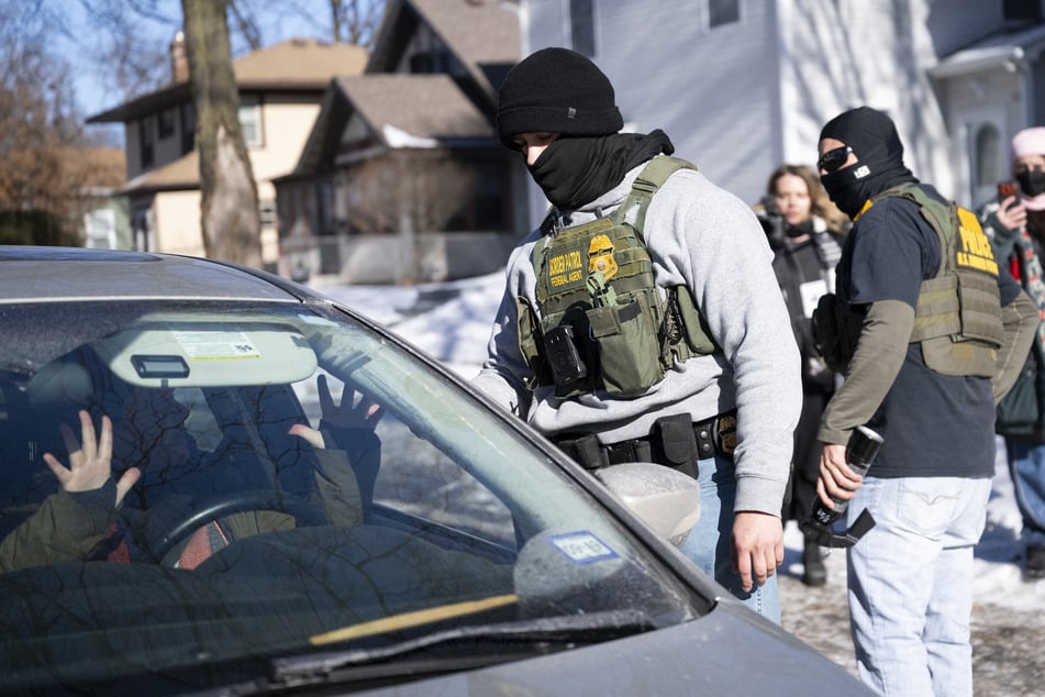 Border Patrol confronting a driver while performing immigration sweeps on January 29, 2026 in Minneapolis, Minnesota.