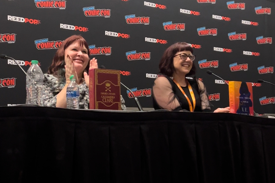 Cassandra Clare (l.) and VE Schwab both dished about their next literary projects while at New York Comic Con 2023.