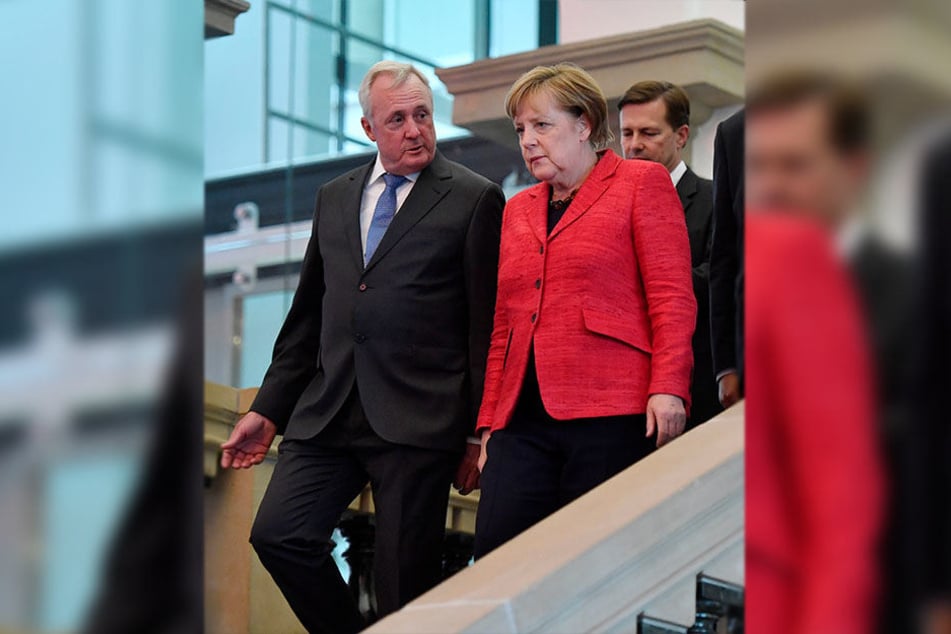 Bundeskanzlerin Angela Merkel (CDU) kommt mit Organisator Axel Pollheim zum Ständehaus-Treff.
