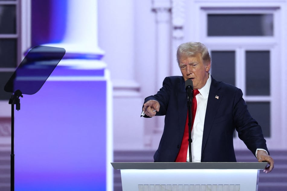 Donald Trump points as he gives his acceptance speech as he secures the GOP nomination on Day 4 of the 2024 Republican National Convention.