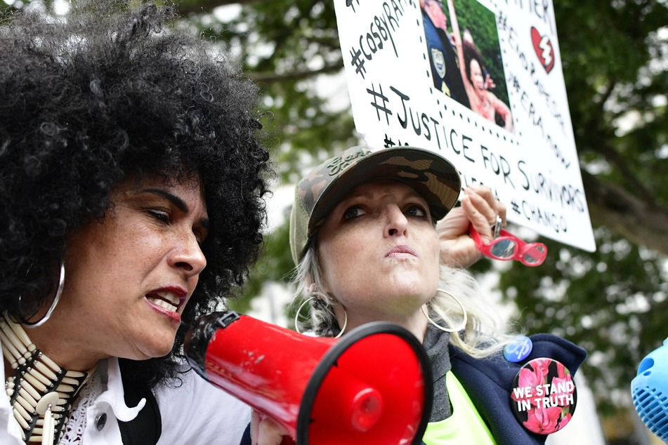 Lili Bernard (l.) joined protests during Bill Cosby's sexual assault trial in Pennsylvania in 2018.