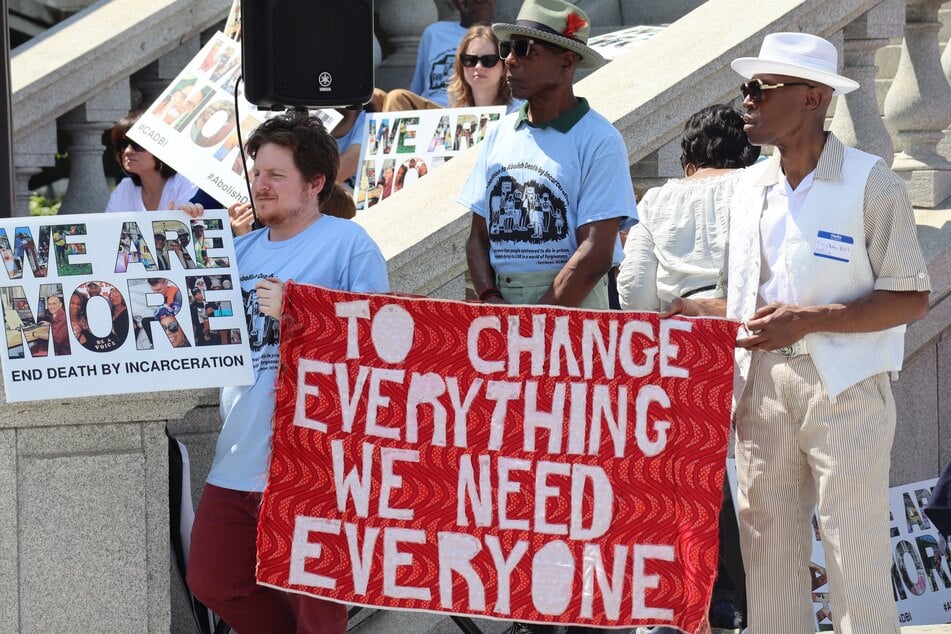 Demonstrators call for an end to death by incarceration outside the Pennsylvania Supreme Court.