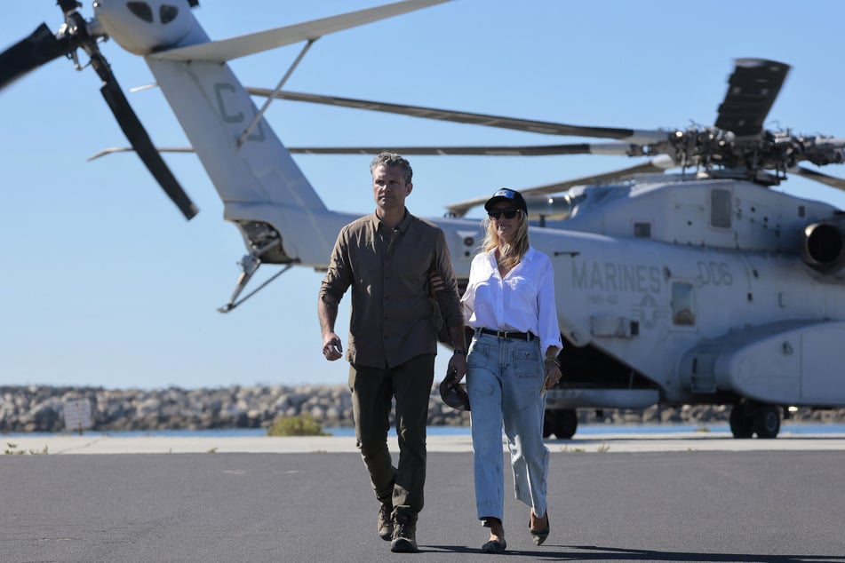 Secretary of Defense Pete Hegseth (l.) channeled Tom Cruise's character in Top Gun while visiting a military base in Nevada.
