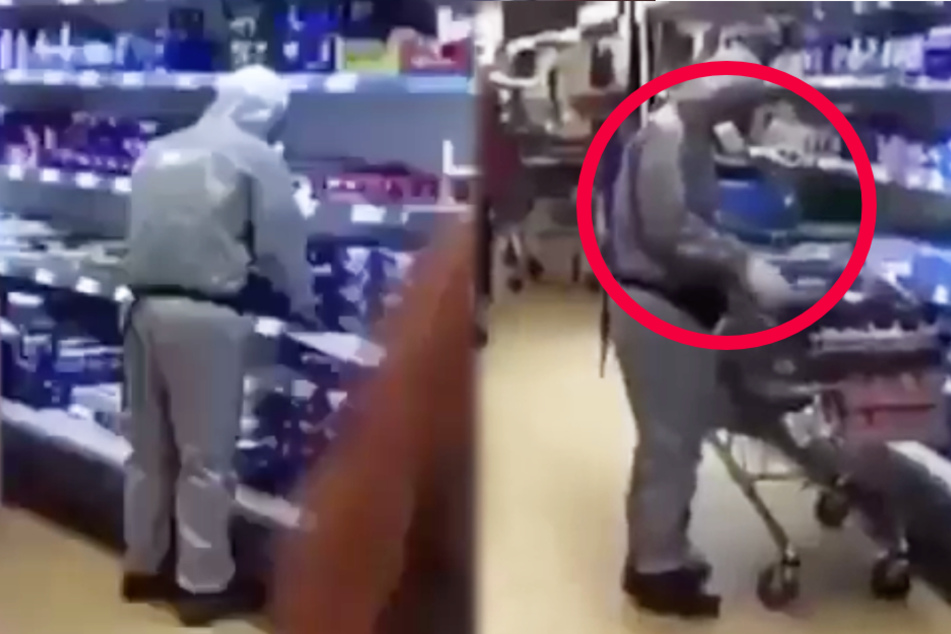 Corona-Panik total? Mann mit Schutzanzug im Supermarkt