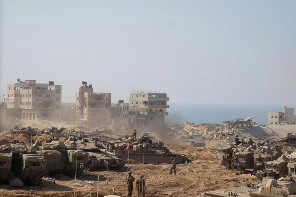 Israeli soldiers and tanks take position inside the Gaza Strip on November 5, according to the Israeli Defense Forces.