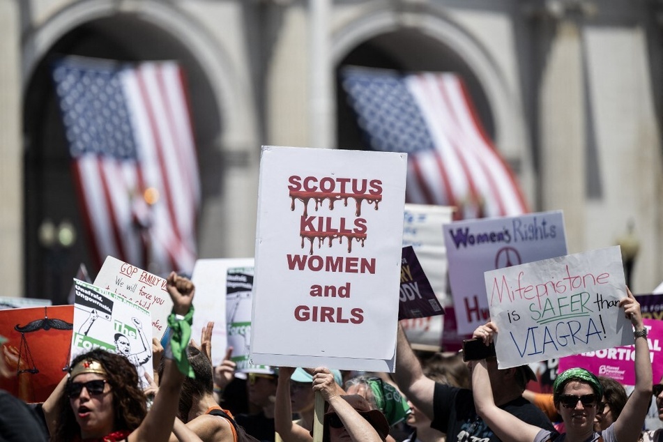 Abortion rights advocates rally outside the US Supreme Court demanding an end to restrictions on reproductive care.