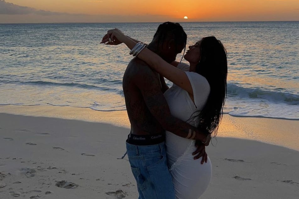 Kylie Jenner (r) has been open about her difficult postpartum recovery following the birth of her second child with Travis Scott (l).