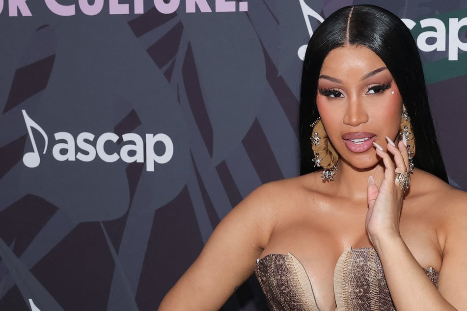 Cardi B unveils new era with bombshell album announcement: "Am I the drama?"