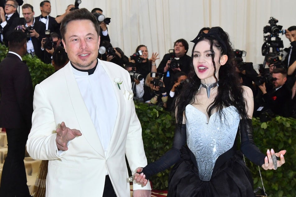 Elon Musk and Grimes (r.) arrive for the 2018 Met Gala on May 7, 2018, at the Metropolitan Museum of Art in New York.