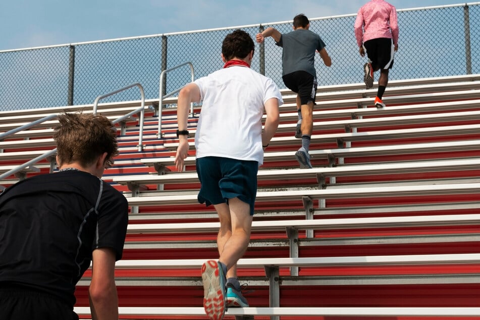 Imani Bell was made to run laps and climb bleachers in a heat index of 106 degrees (stock image).