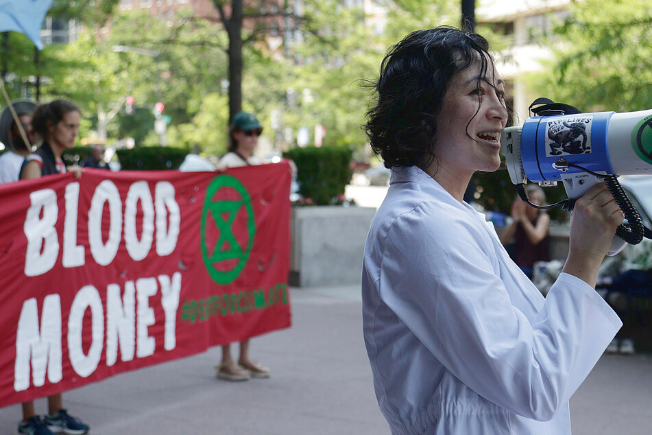 Dr. Rose Abramoff took to the streets of Washington DC to protest the climate debt trap.