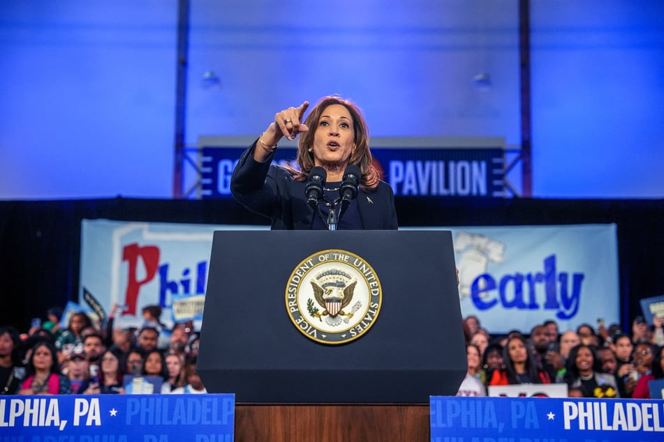 Democratic presidential nominee, US Vice President Kamala Harris (c.) speaks during a campaign rally at The Alan Horwitz "Sixth Man" Center on Sunday in Philadelphia, Pennsylvania.