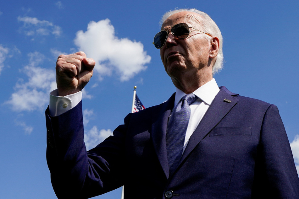 President Joe Biden gestures as he speaks to reporters after a wreath-laying ceremony at Aisne-Marne American Cemetery in Belleau, France.