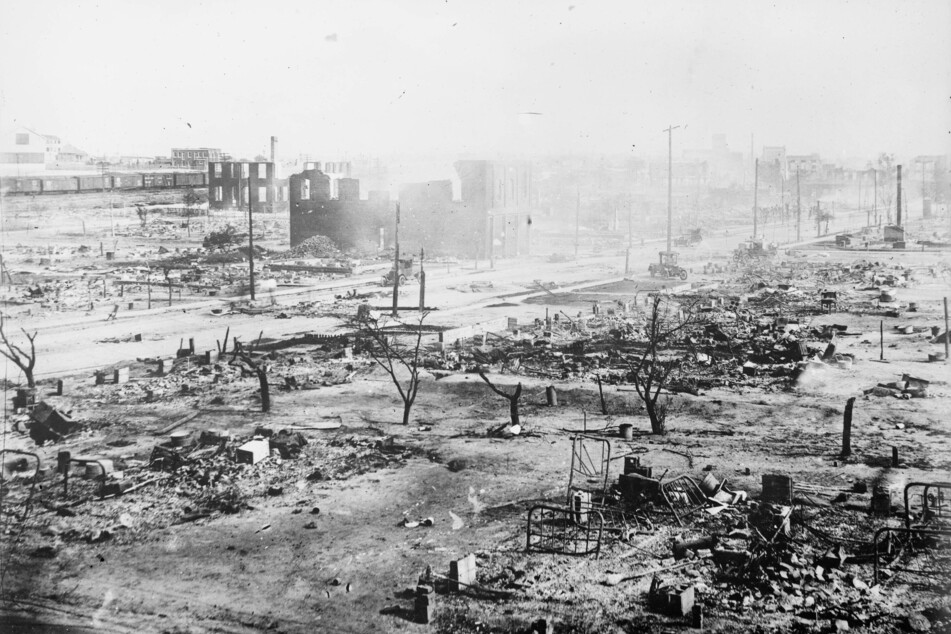 Tulsa's thriving Greenwood District is reduced to rubble in the infamous 1921 race massacre.