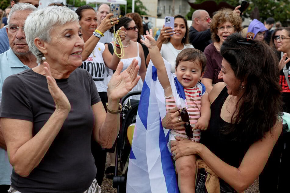 Israelis also flooded the streets to celebrate the announcement, as well as the imminent release of captives still held Gaza.