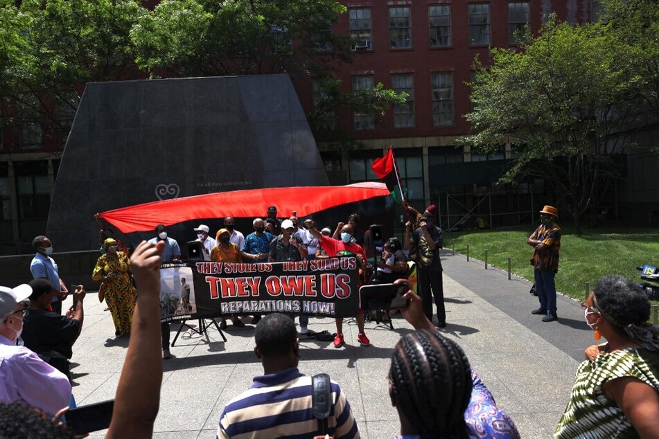 Protesters rally for reparations at the African Burial Ground National Monument in New York City.