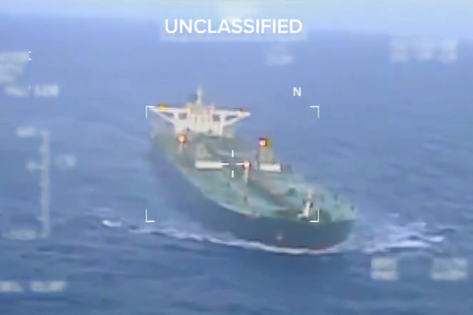 This screen grab taken from a video posted on the X account of US Secretary of Homeland Security Kristi Noem shows the Centuries crude oil tanker, last docked in Venezuela, as it is apprehended by the US Coast Guard on Saturday.