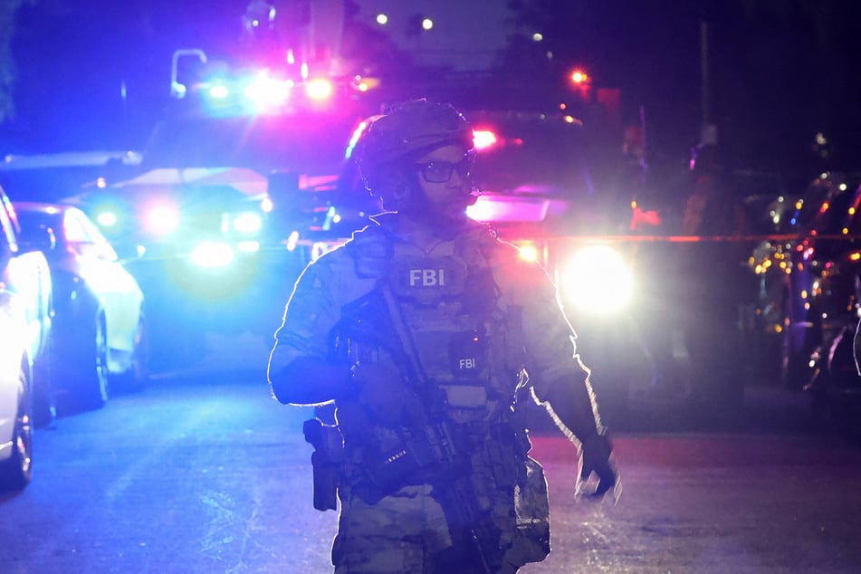 An FBI tactical team prepares to enter a house associated with the suspected White House Correspondents’ Dinner shooter in Torrance, California, on April 25, 2026.