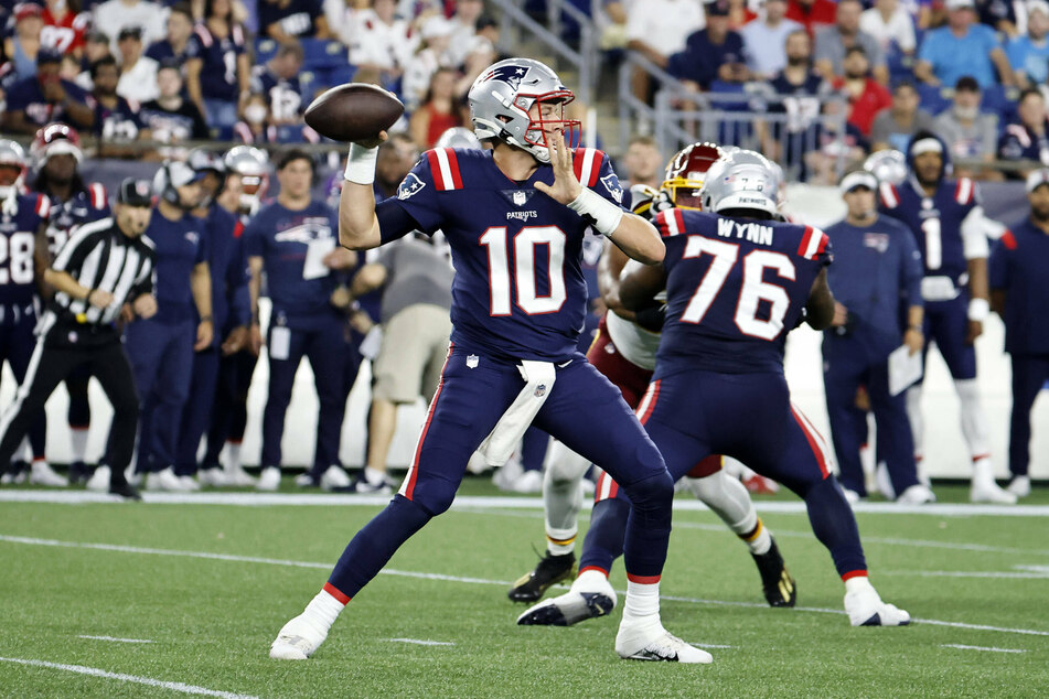 Patriots quarterback Mac Jones (c) led New England to score 16 of their 22 points during Sunday's win over the Giants.