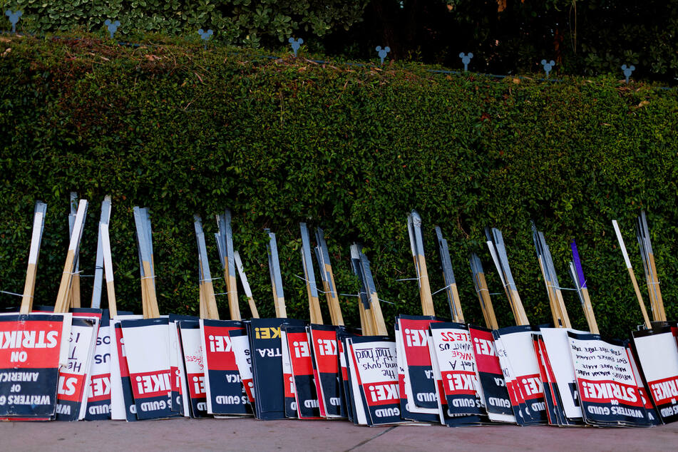 Strike signs await striking SAG-AFTRA actors and Writers Guild of America (WGA) writers outside Disney Studios in Burbank, California.