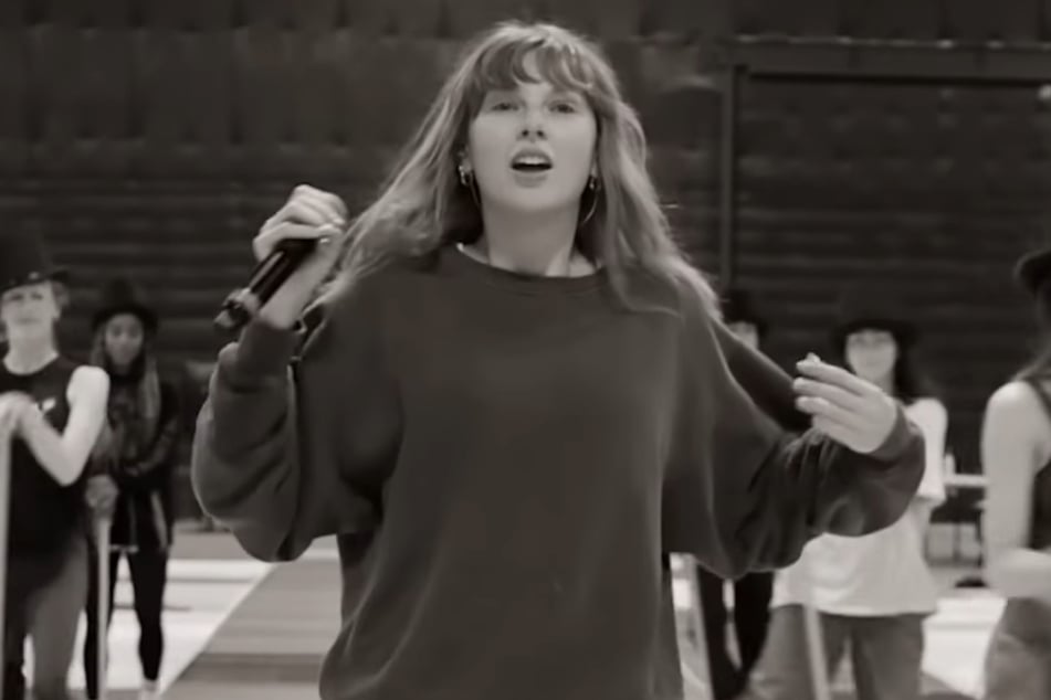 Taylor Swift appeared to be rehearsing a brand-new number for The Eras Tour in a new clip shared to YouTube.