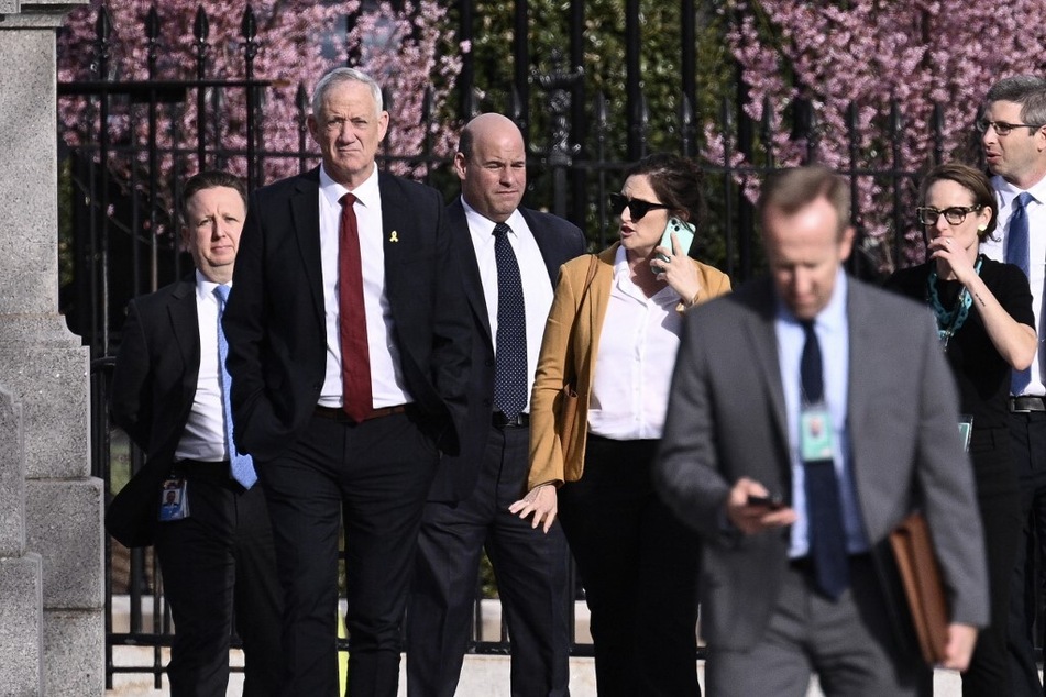Israeli war cabinet member Benny Gantz (second from left) departs the White House after meeting with Vice President Kamala Harris on March 4, 2024.