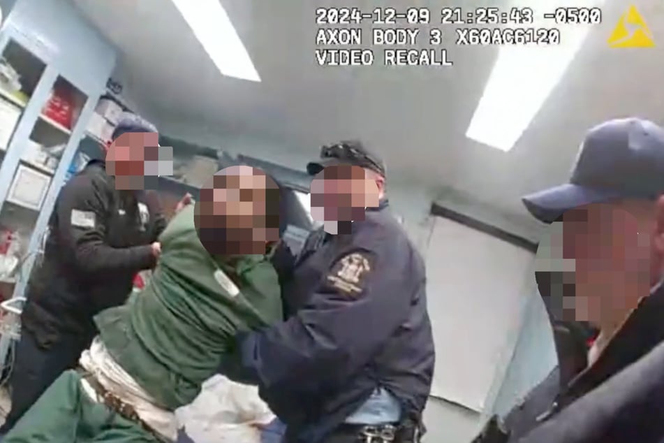 Video footage shows Brooks being carried into an examination room at the detention center.