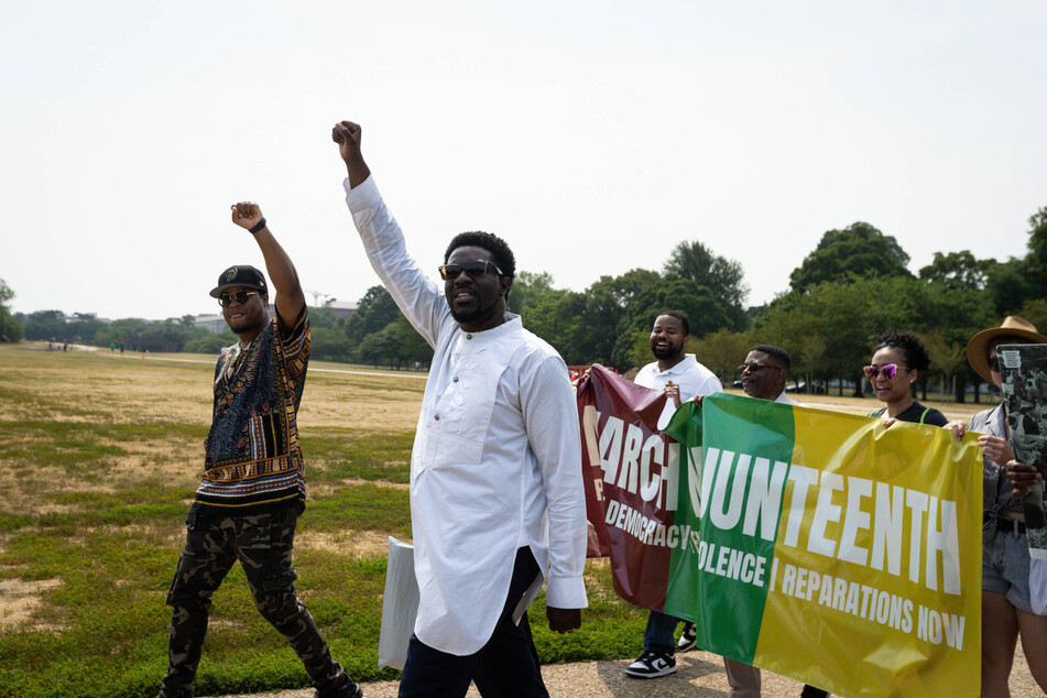 Faith leaders and activists march for Reparations Now on Juneteenth 2023 in Washington DC.