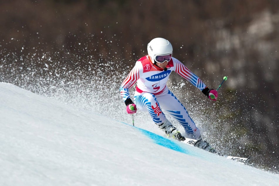 Veteran Para-skier Danelle Umstead will share flag-bearing duties during the opening ceremonies of the 2022 Winter Paralympics.