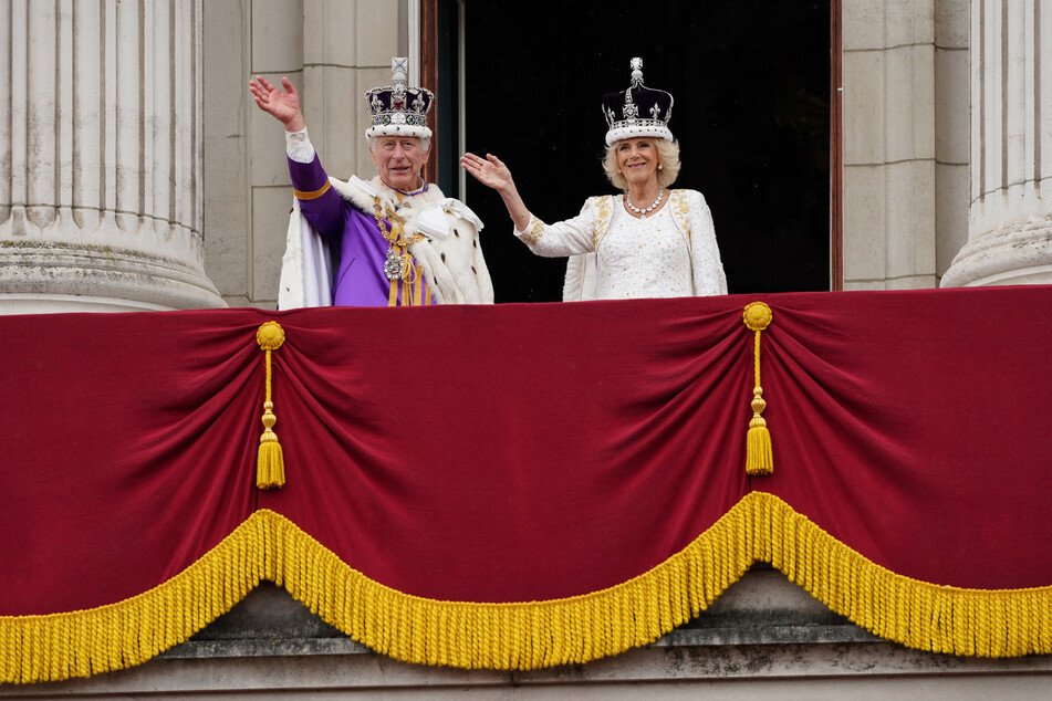 King Charles III and Queen Consort Camilla set the seal on their historic coronation day with a Buckingham Palace balcony appearance to acknowledge the crowd.