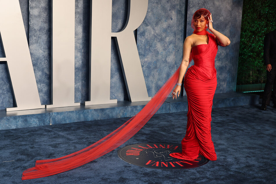 Cardi B's look at Vanity Fair’s Oscar Party was bold red and stunning!