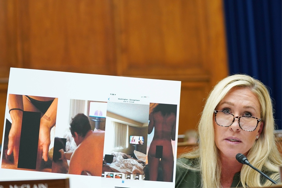Marjorie Taylor Greene displaying sexually explicit photos of Hunter Biden during a House Committee on Oversight and Accountability hearing on July 19, 2023.
