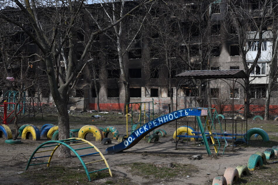 A playground in front of a destroyed residential building in Mariupol, Ukraine.