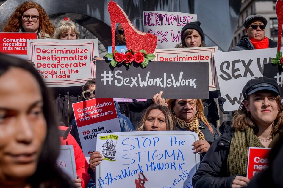 Lawmakers and activists from dozens of advocacy organizations rally for decriminalization of sex work at Foley Square in New York City.