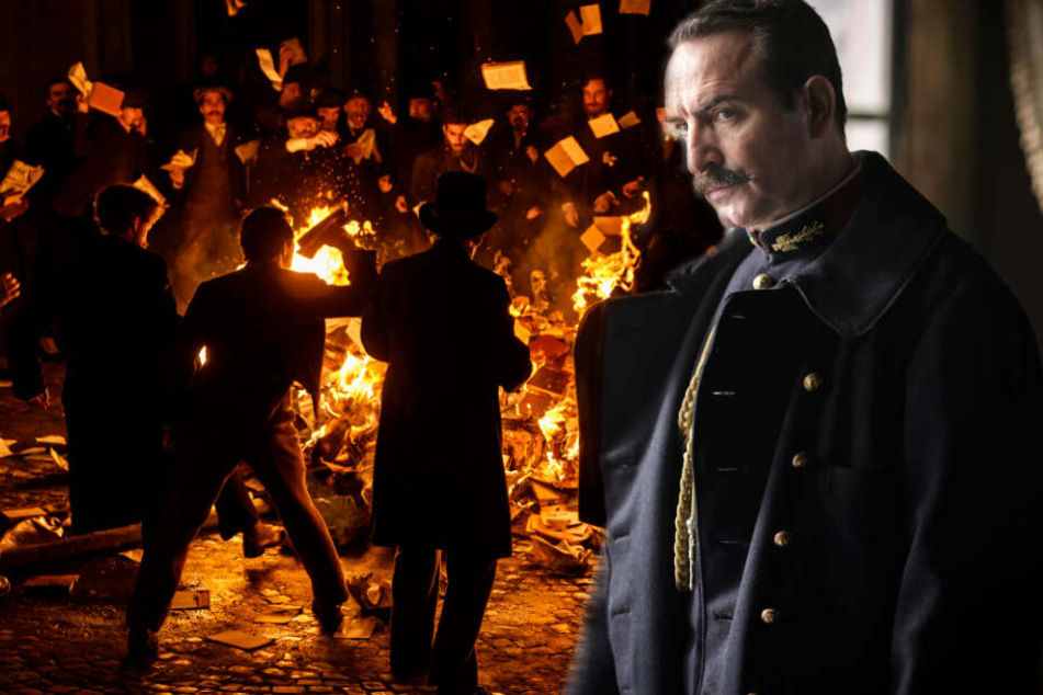 Die Reaktionen auf Zolas Brief sind extrem. Einige Menschen verbrennen seine Bücher (l.). Colonel Georges Picquart (Jean Dujardin) ist ihm hingegen dankbar für die Unterstützung.