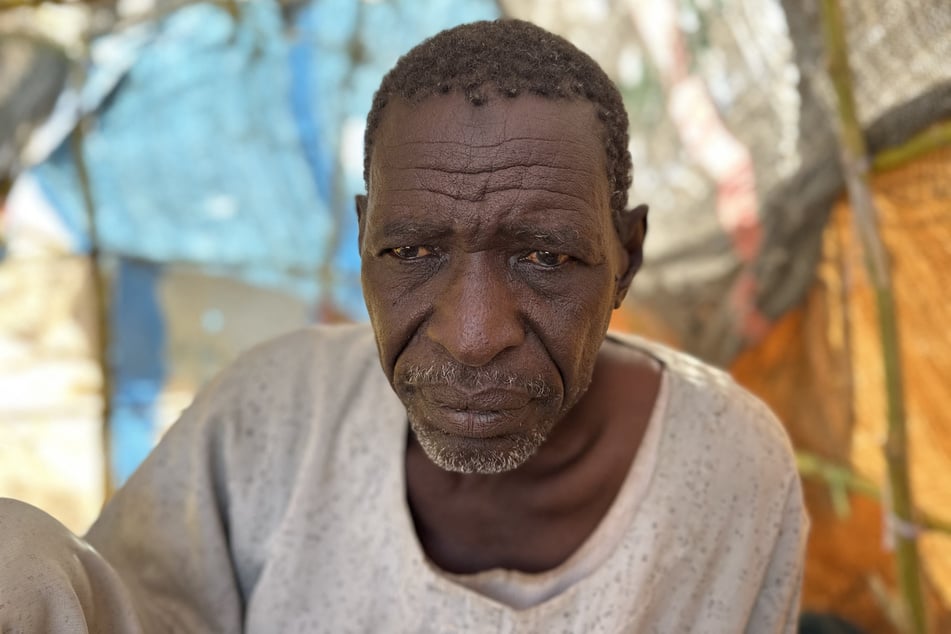 Ahmed Aman is pictured at a makeshift shelter in the Sudanese town of Tawila on March 2, 2026.