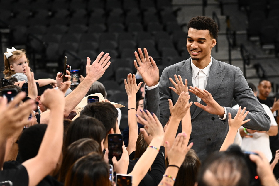 Victor Wembanyama was greeted by San Antonio Spurs fans ahead of his first practice session with the team.