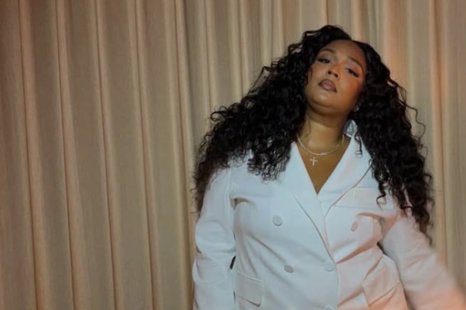 Lizzo opened up about her struggles after being sued for sexual harassment by former dancers.