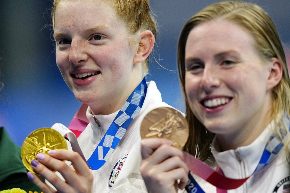 Lydia Jacoby celebrates winning gold in the Women's 100m Breaststroke along with her US teammate Lilly King who won bronze