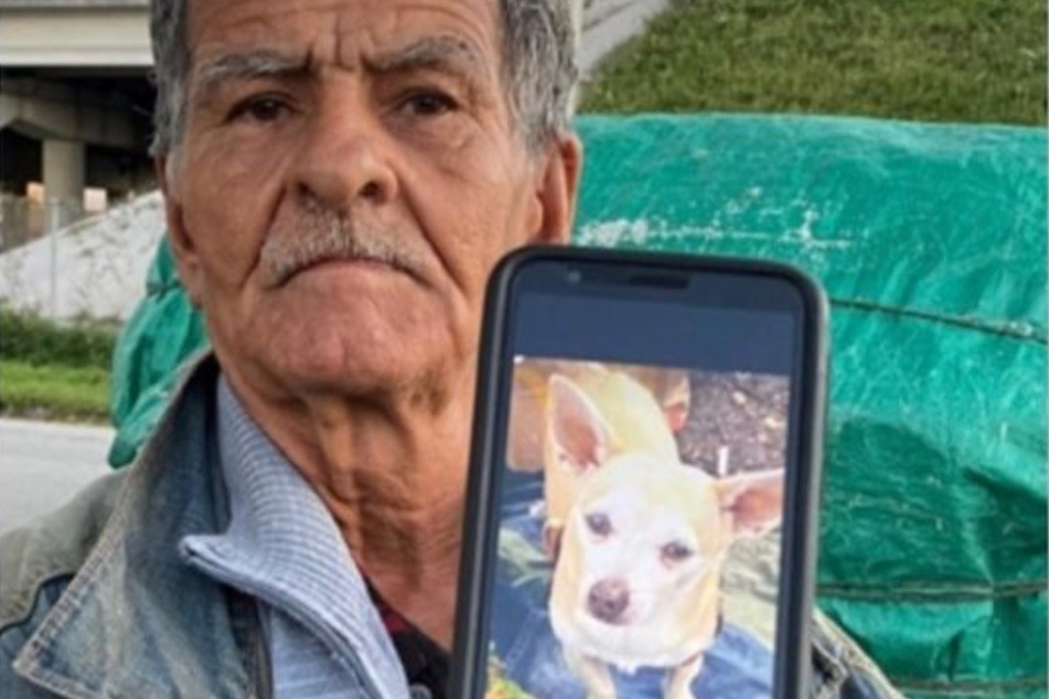 Pedro shows a picture of his beloved pet.