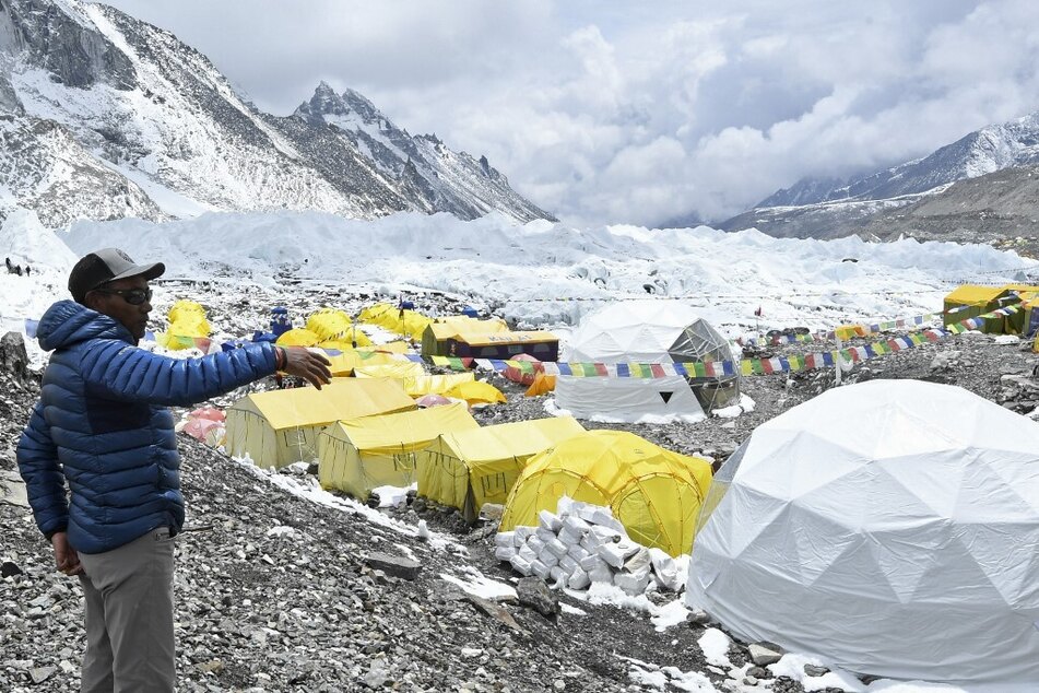 Kami Rita Sherpa gestures at the Everest base camp in the Mount Everest region of Solukhumbu district, Nepal.