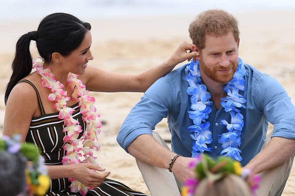 Auf ihrer ersten Auslandsreise zeigten sich Harry und Meghan verliebt wie eh und je.