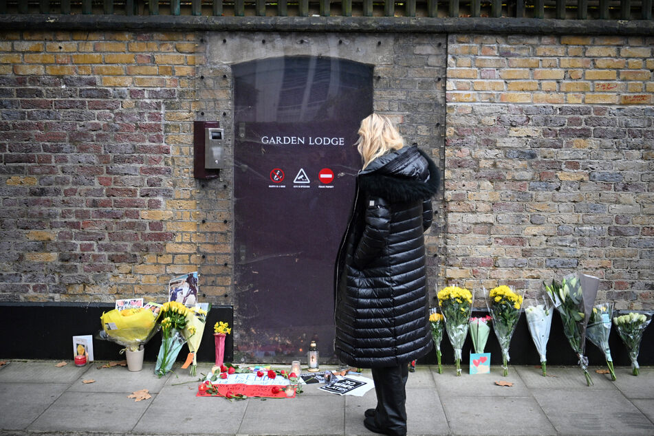 Fans still visit and pay tribute to Freddie Mercury of the rock band Queen outside his former home Garden Lodge in London.