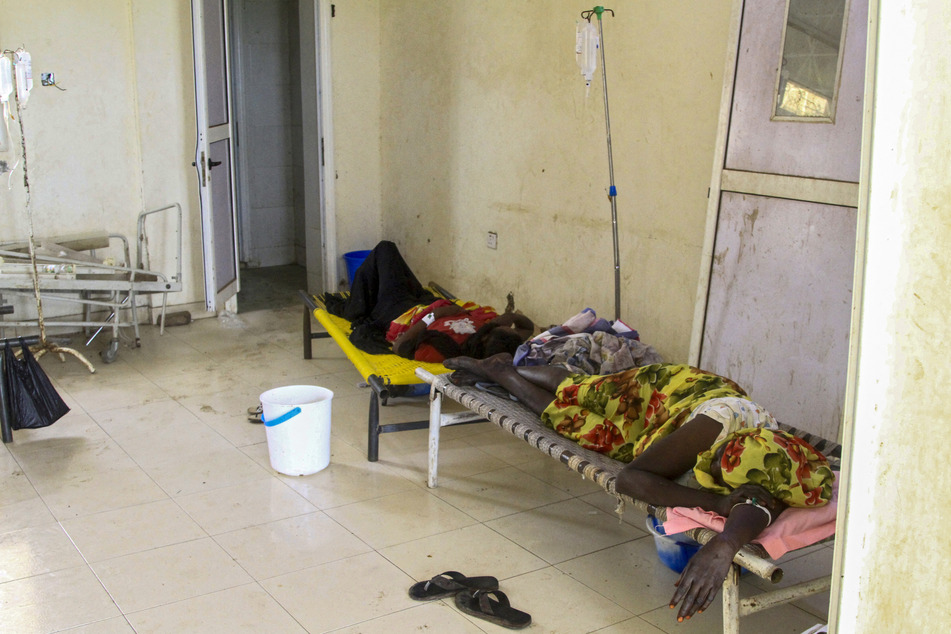 Patients suffering from cholera receive treatment at a rural isolation centre in Wad Al-Hilu in Kassala state in eastern Sudan, on August 17, 2024.