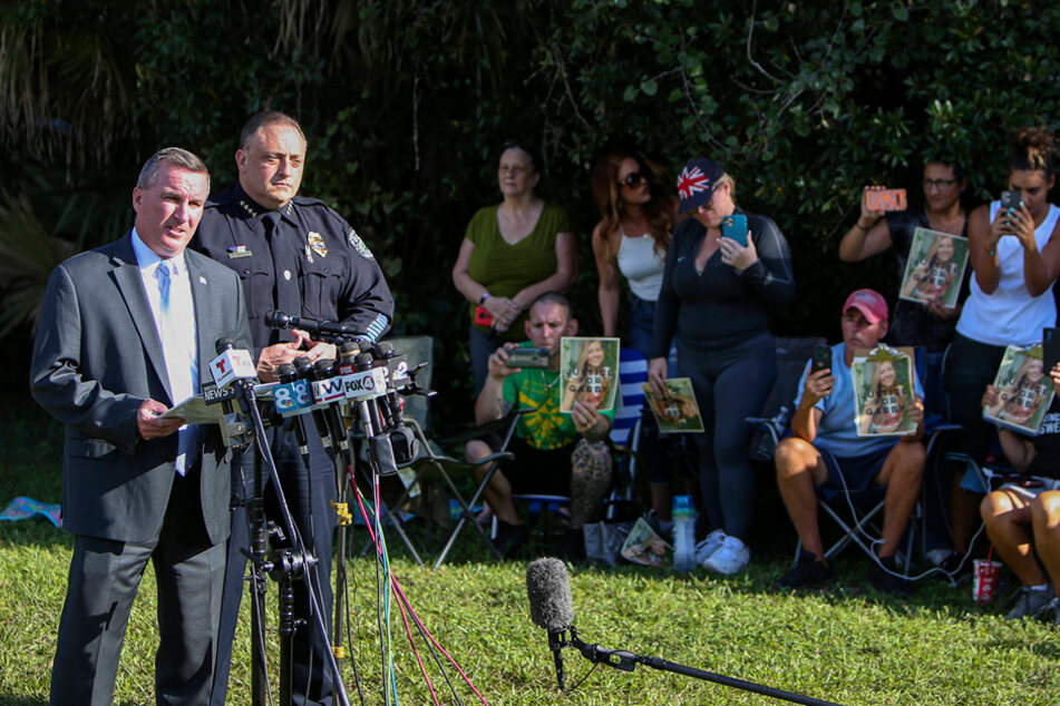 Tampa FBI Agent Michael McPherson (l.) with North Port Police Chief Todd Garrison (r.) hold a press conference at Myakkahatchee Creek Environmental Park on October 20.
