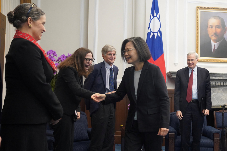 Taiwan's President Tsai Ing-wen greets American Institute in Taiwan Chair Lauren Rosenberger at the Presidential building in Taipei on January 15, 2024.