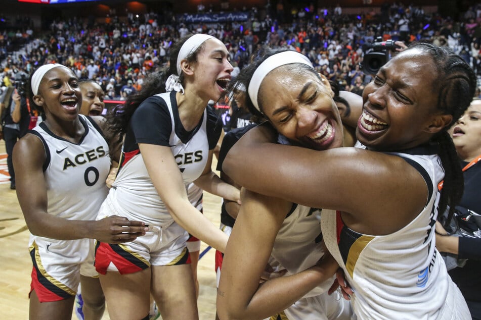 The Las Vegas Aces celebrate after winning the WNBA Championship against the Connecticut Sun in game four of the 2022 WNBA Finals.